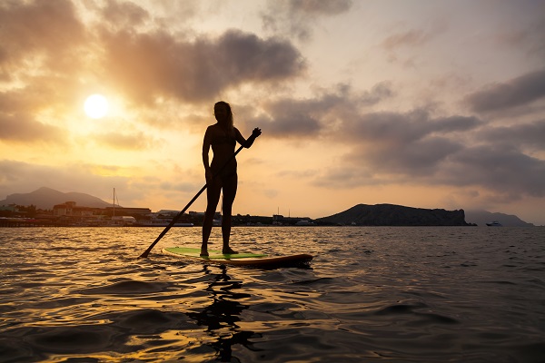 Woman on SUP board that is perfect for her.